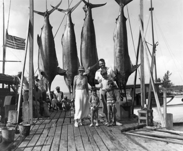 EH1669N Pauline, Patrick, Ernest, John, and Gregory Hemingway with four marlins on the dock in Bimini, 20 July 1935.  Please credit, "Ernest Hemingway Collection/John F. Kennedy Presidential Library, Boston."