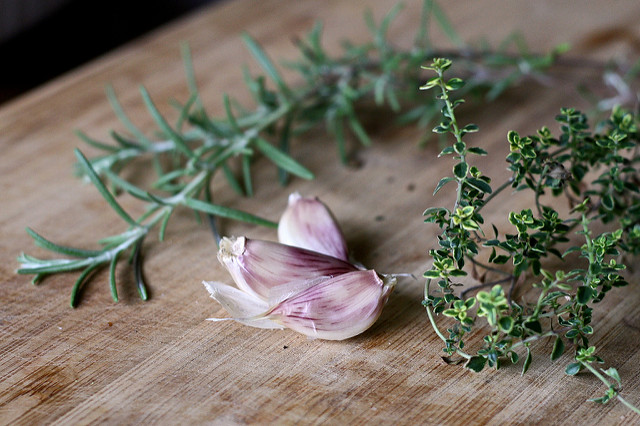 Put herbs on grill